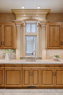 Butler Pantry is complete with a window over the sink.