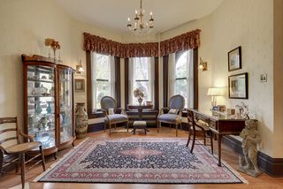 The Main Floor Living Room features this large Bay Window...