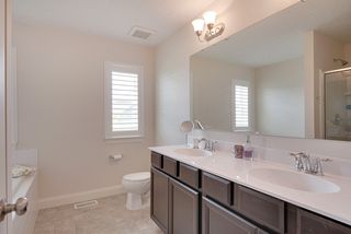 Master bath with separate tub and shower and lovely tile floor - 3942 Campello Curve