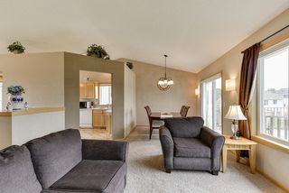 Vaulted ceiling adds dimension to the living/dining and kitchen