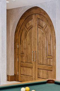 Beautiful Doors lead to Wine Cellar.