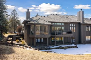 Back of home and the side terrace where you can have a garden or  flower bed in the timber planters.  There are some perennials already present.