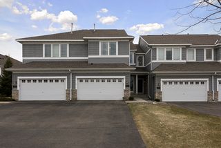 Lovely townhouse on quiet tree-lined street... Long driveway with room for guest parking 