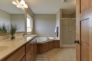 Higher cabinets and double sinks in the master bathroom
