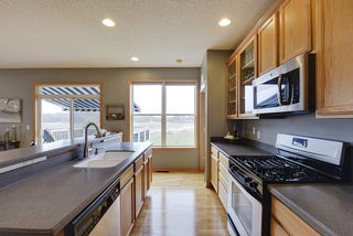Kitchen opens up to deck and backyard.