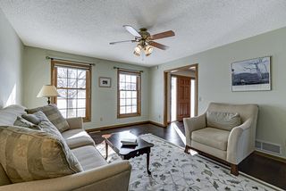 Ceiling fans, wood floors, natural wood work