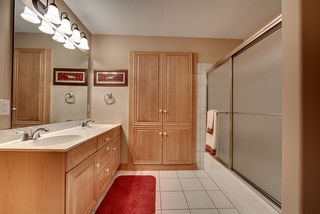 Adjoining 3/4 bath, tiled floors.