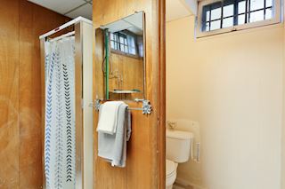 Basement bathroom in laundry room