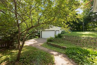 Plus a lovely lot with a terraced back yard