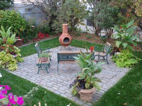 Enjoy the Season from this Custom Designed Stone Patio (utilizing the Original On-Site Granite Pavers)