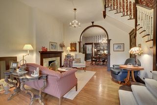 Entertain in style! The Main Floor Living Room features all of the original charm & detail...