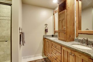 The Master Bath has "his and her's" separate vanity spaces with a solid surface countertop and integral bowl sinks.