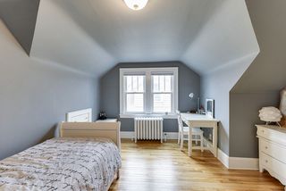 2nd bedroom on upper level with recessed drawers, walk-in closet