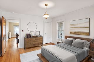 virtually staged bedroom 2 with sunroom connection