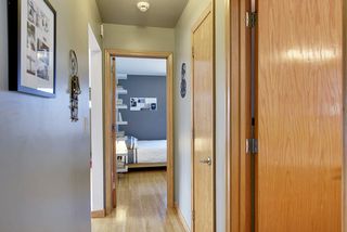 Pristine Condition! The Main Floor Hallway leads to the Bathroom and Two (2) Main Floor Bedrooms! 