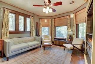 The Main Floor Den/Library features Three (3) Original Stained Glass Windows! 