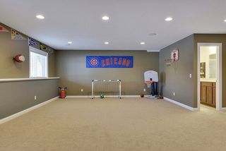It's a game space shown here, but this space can easily be partitioned into a 5th bedroom. Large window provides legal egress. 