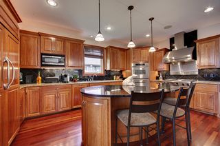 Sub Zero Refrigerator freezer, Bosch dishwasher, Viking gas range, Kitchen Aid double oven.