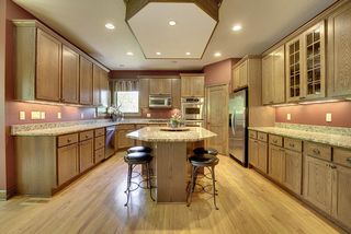 Large island area with seating for the family breakfast or late afternoon homework space.