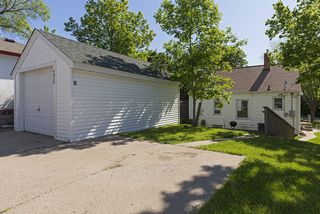 Convenience of one car garage and extra parking...