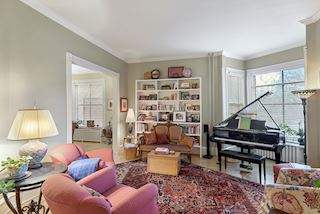 Living room offers a wonderful gathering spot and music room