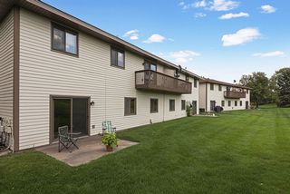 Well-maintained one level townhouse with patio open to green space...