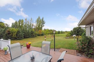 Large deck off kitchen provides great views of backyard