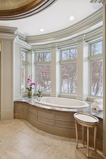 Soaking Tub with Hidden Electric Blinds.