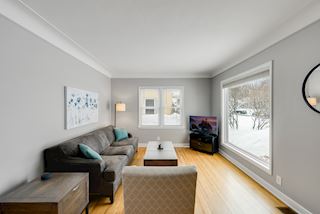 Beautiful picture window allows for natural light in the front living room