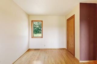 First floor bedroom with beautiful hardwood floors