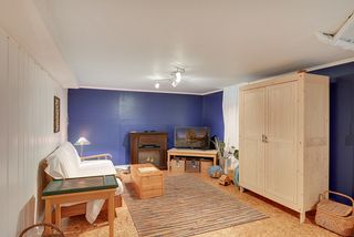 The Lower Level Family Room is perfect for the visiting "House Guest" or "Teenager Hide-a-Way"...