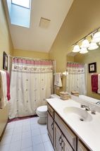 Vaulted Upper Level Hallway Bath