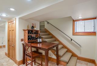 Lower level steps that lead to Family Room, Laundry and 3/4 Bathroom