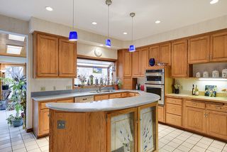 Open - bright - light kitchen with room for friends and family who like to hang here...