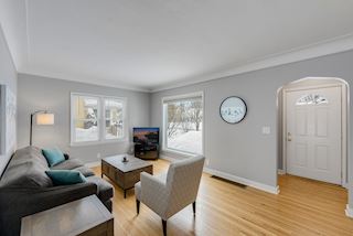 Front entry with closet leads into the front living room