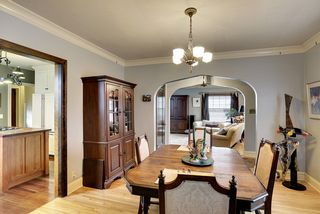 Entertain in style! The Dining Room features a beautiful Period Light Fixture! 