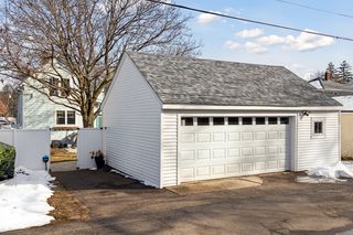 Insulated garage door and guest parking