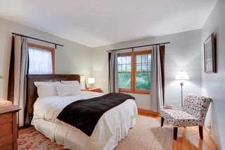 Main Floor Bedroom #2 features Hardwood Floors & Garden Views....