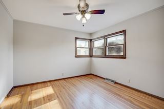 Main Floor Bedroom-Fresh paint, fan, Marvin Windows