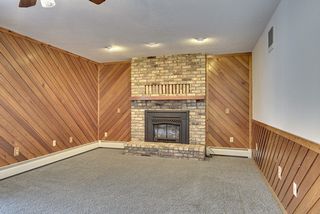 Gas fireplace with brick surround. 