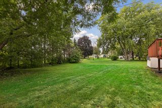 Mature trees provide a semi-private backyard setting