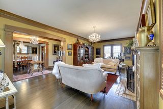 Another view of the gracious Living Room with Crystal Chandelier...
