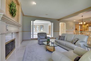 Crown moldings and arched openings define the space.
