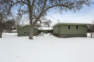 Lovely deck off family room overlooking spacious back yard