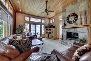Natural cedar ceiling, imported stone from Aspen, Colorado with a limestone hearth.