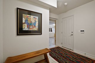 Lower Level has entry into the large two car  tuckunder Garage, Hall Closet and Mudroom that leads to the Fourth Bedroom/ Media/Family  Room with three quarter Bath and Closet