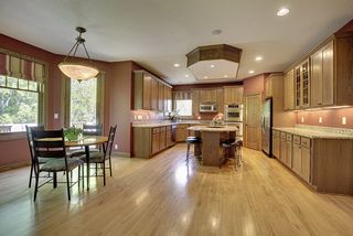 Dream Kitchen area - Natural river maple hardwood floors, special molding details throughout this space.