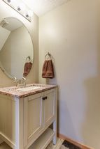 Lower level powder room with nice finishes