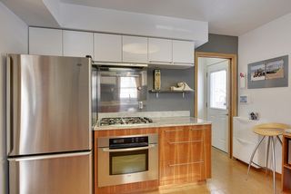 WOW! The custom Kitchen features a Bosch Wall Oven, Cork Floors & Gas Cooktop! 
