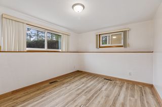 Spacious lower-level third bedroom with lots of natural light